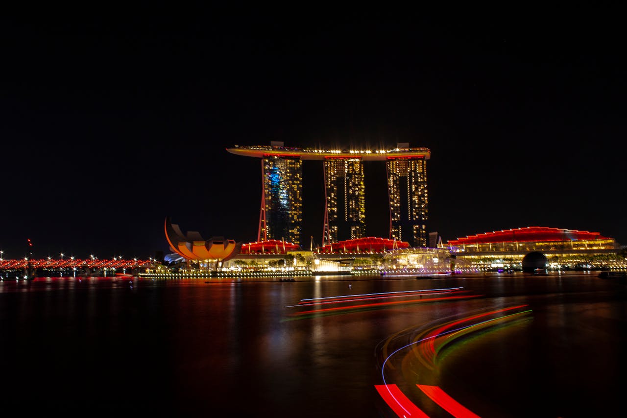 Stunning night view of the iconic Marina Bay Sands Resort in Singapore, beautifully illuminated.